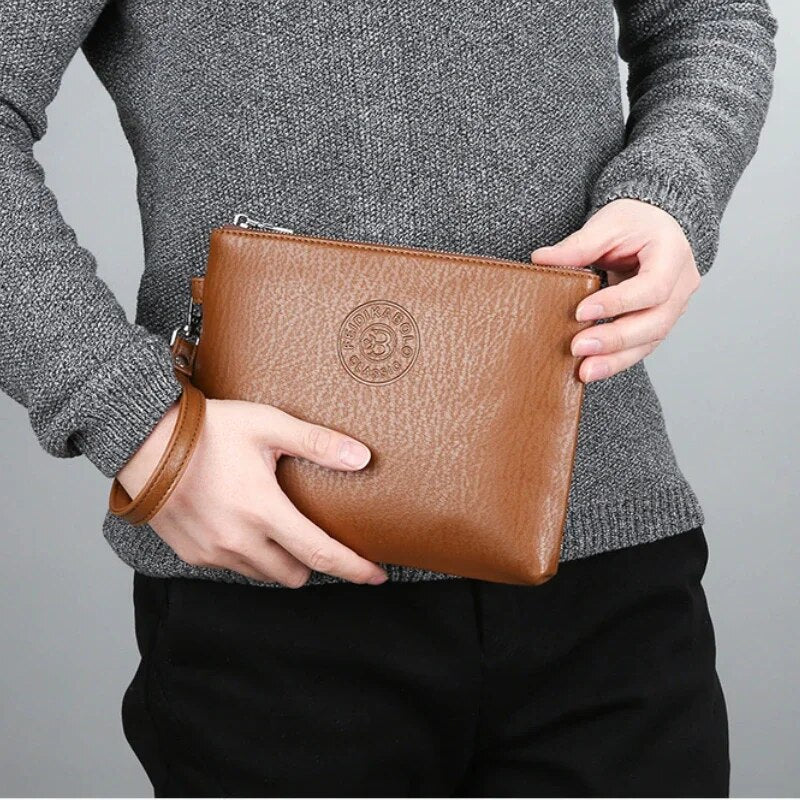 CARTERA DE MANO DE CUERO SUAVE MUY ELEGANTE, PARA HOMBRE.